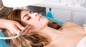 Woman doing cosmetic procedures
