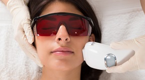 Beautician Giving Epilation Laser Treatment